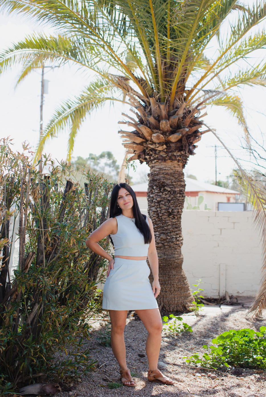 Top features a high, round neckline and sleeveless silhouette for ultimate comfort, style, and ease-of-wear